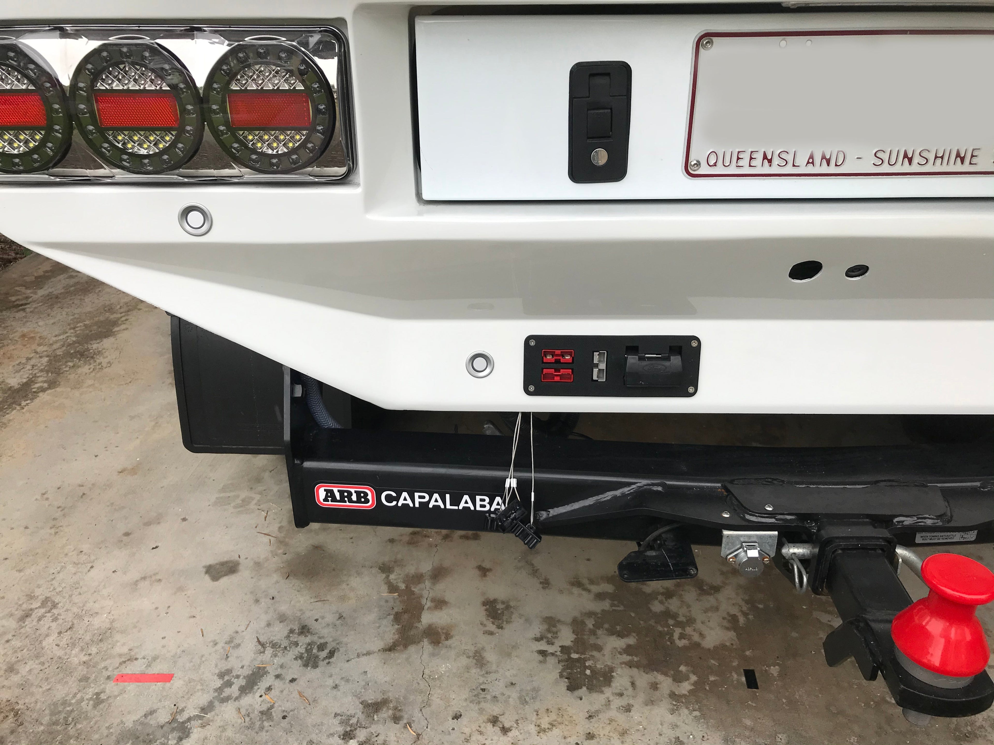Narva flush mount plug panel with Anderson connector cutouts fitted to an aluminium ute canopy