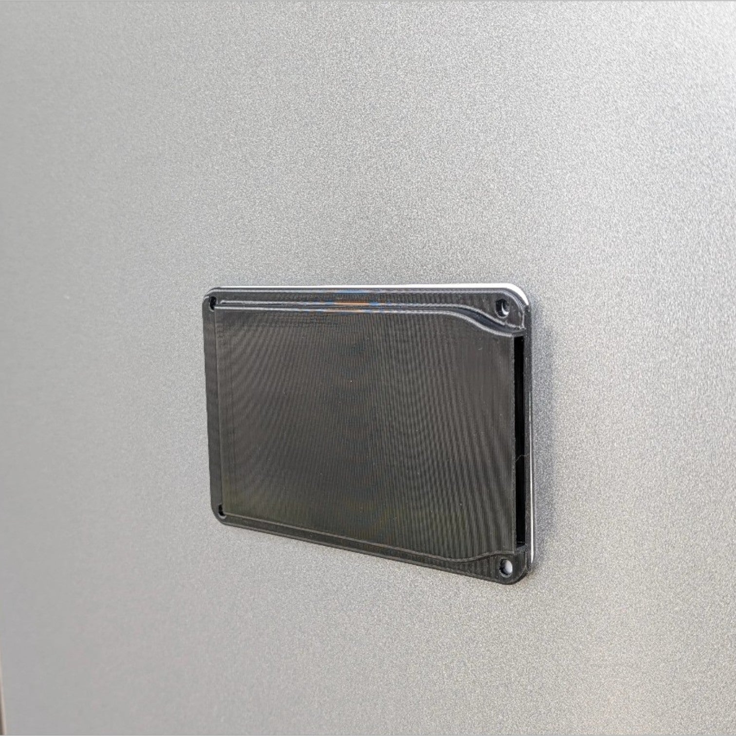 VANKOR caravan vent cover in gloss black, 150 x 100mm, fitted to a caravan vent