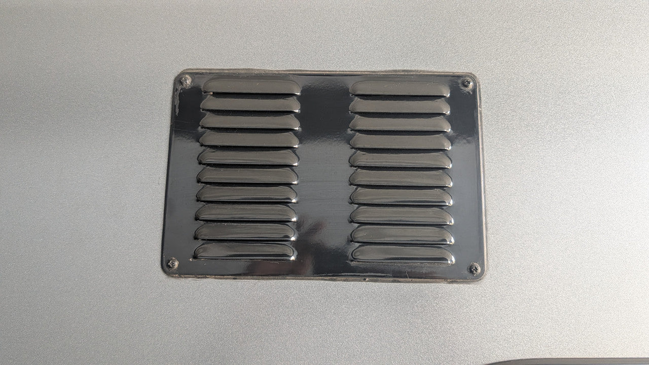 Caravan vent cover side angle showing open rear for airflow