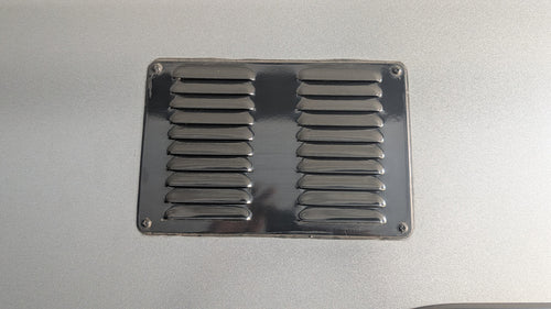 Caravan vent cover side angle showing open rear for airflow